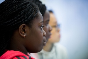 A young person listening